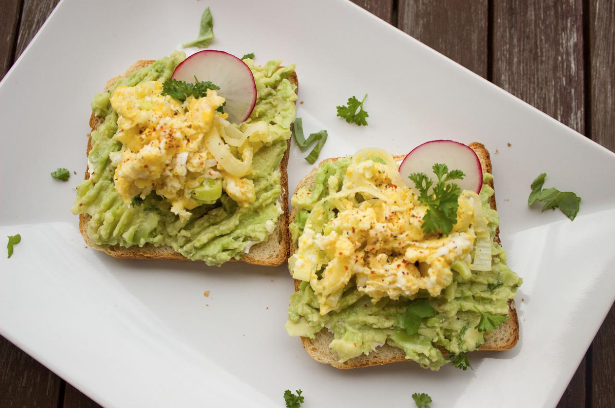 Avocado on toast with scrambled eggs